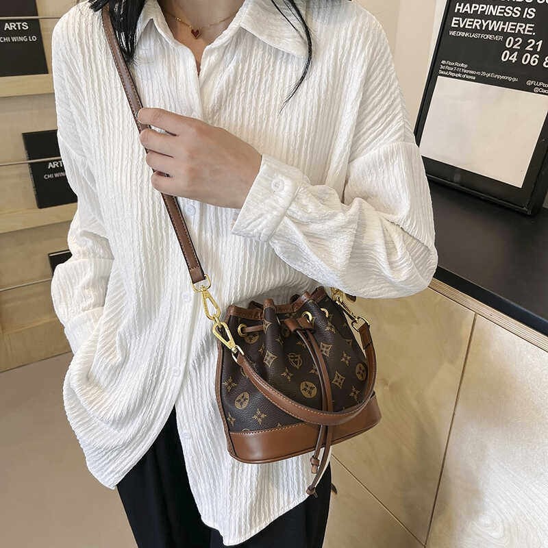 CITEX LV官方旗舰店2025新款复古老花抽绳迷你小水桶包百搭真皮单,淘宝优惠券,粉丝福利购,淘宝优惠卷