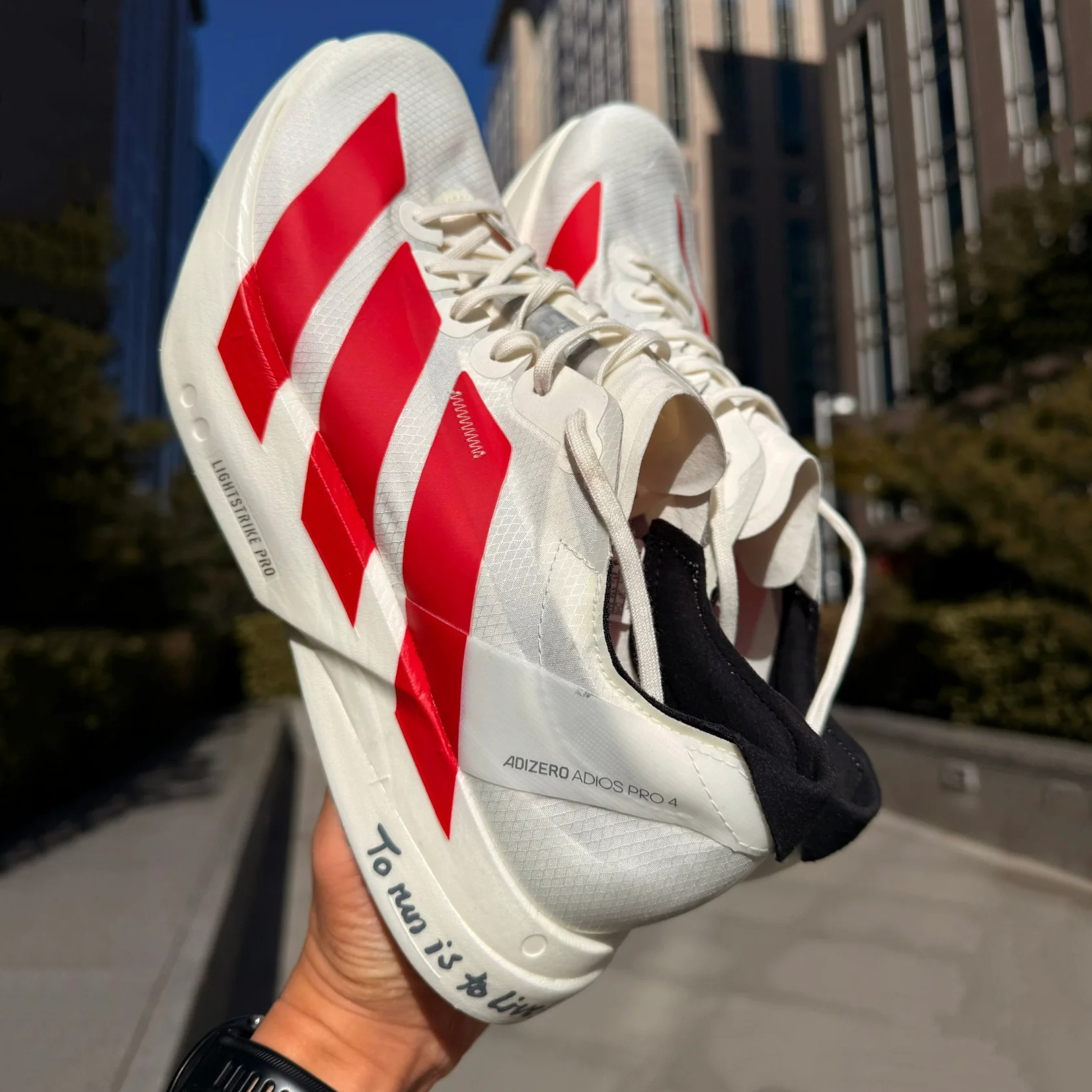 阿迪达斯ADIZERO ADIOS PRO 4 马拉松碳柱跑步鞋男女运动鞋JR6363 - 图1