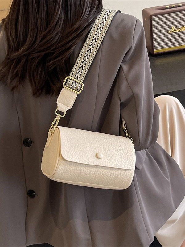 今年流行泡泡纹女包2024新款质感女士单肩斜挎包春夏宽肩带圆筒包,淘宝优惠券,粉丝福利购,淘宝优惠卷