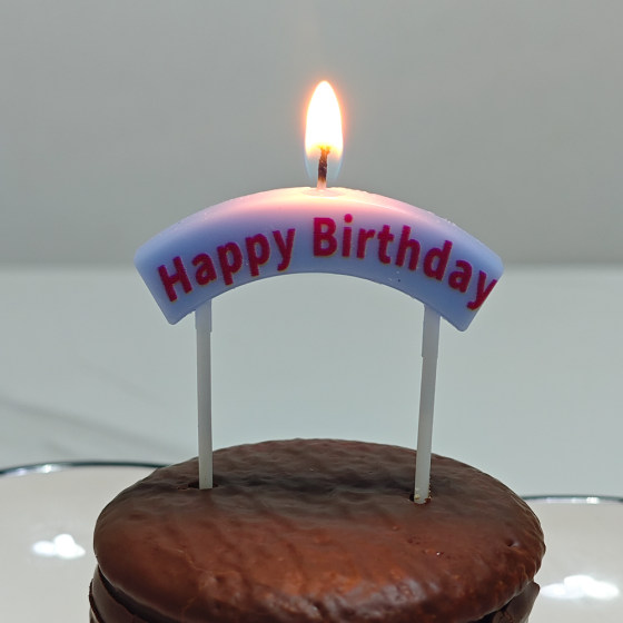 Yellow arch candle birthday cake decoration