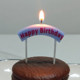 Yellow arch candle birthday cake decoration