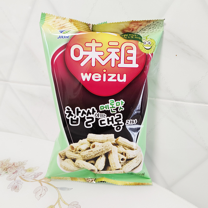 韩国进口休闲零食品九日牌哈密瓜味打糕条膨化炒年糕条100g/袋装