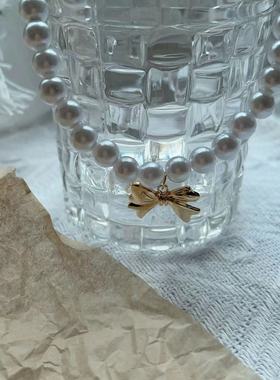 金色蝴蝶结项链~珍珠复古高级感轻奢赫本风锁骨链颈链2023年新款