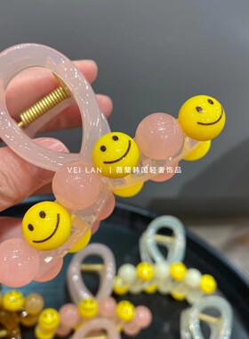 黄色笑脸大肚子抓夹盘发鲨鱼夹