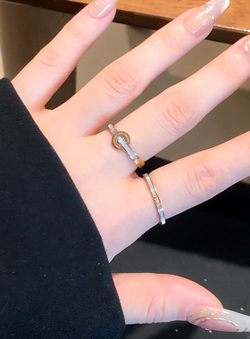 仿白贝母一钻钛钢戒指女简约轻奢