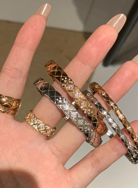 玫瑰金蛇形菱格蝴蝶结万花筒手镯