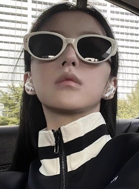白色猫眼ins辣妹风拍照墨镜女