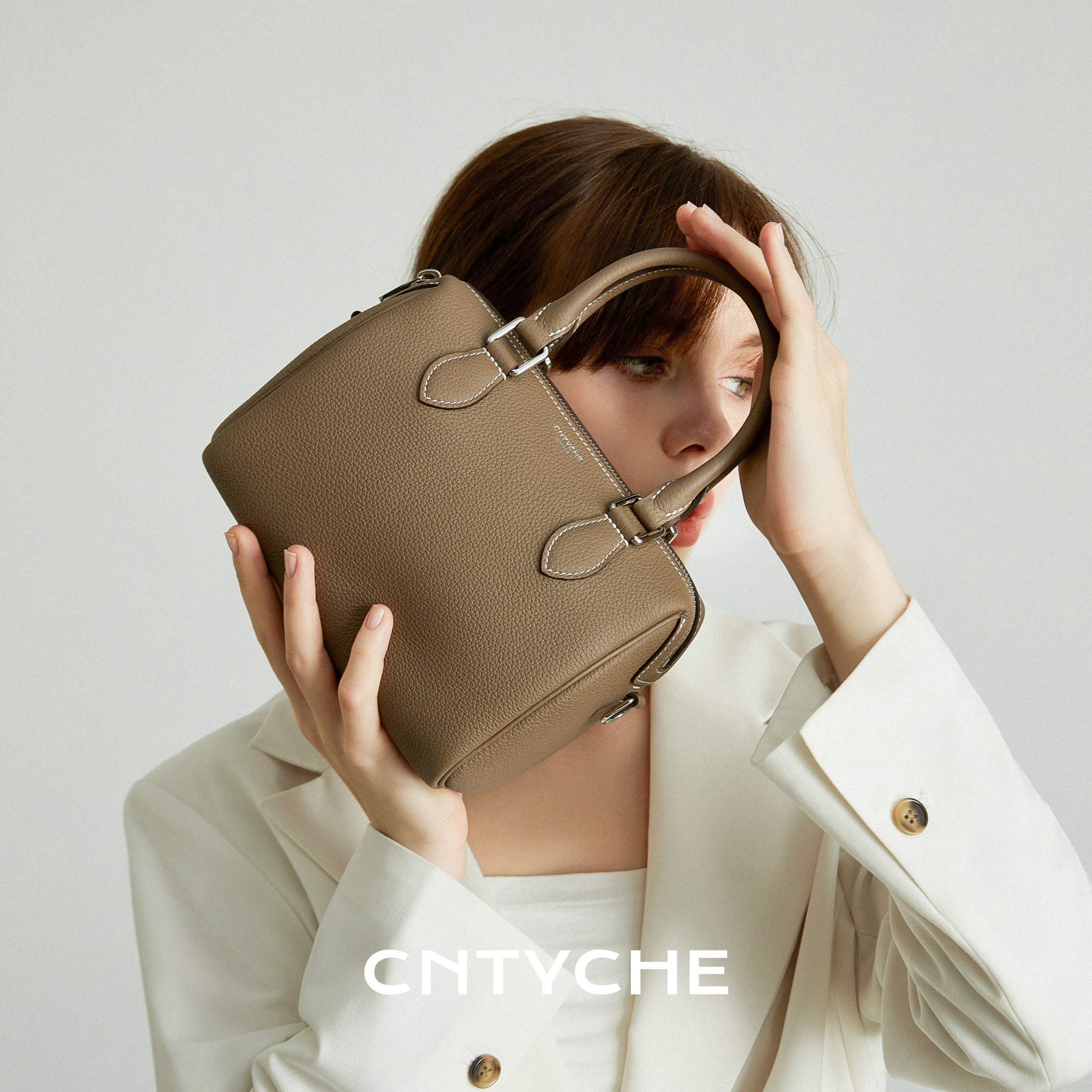 CNTYCHE/堤喀2026新款小号波士顿包进口TOGO皮单肩手提女包枕头包,淘宝优惠券,粉丝福利购,淘宝优惠卷