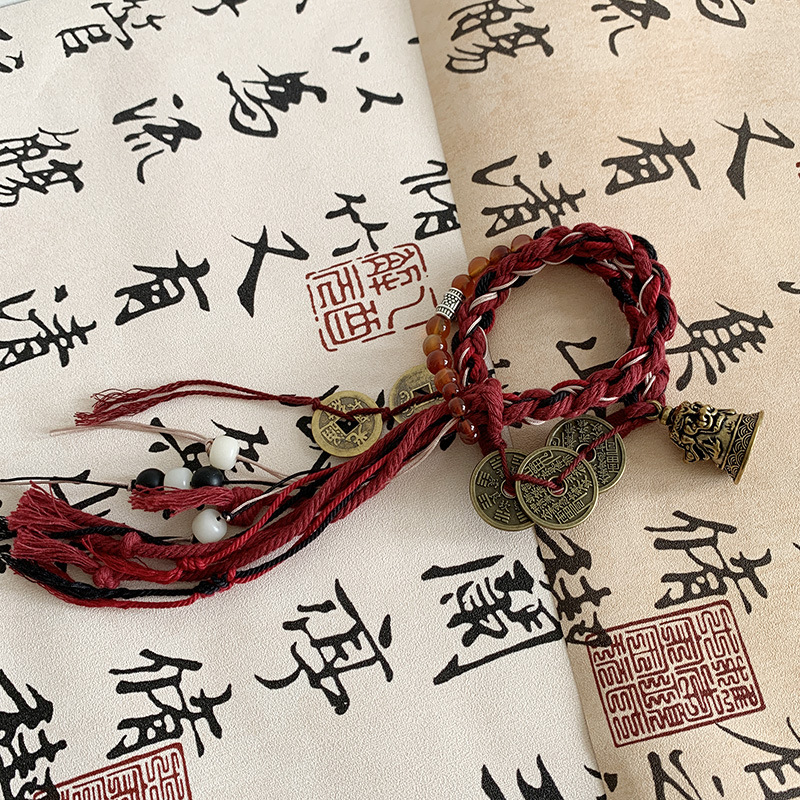 仙贤遥手链藏族风新中式编织小红书同款流苏国潮手绳山鬼花钱手饰