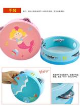 The kindergarten teacher used a bell drum dance prop baby boys baby boy shake hands to take a small hand drum special musical instrument toy