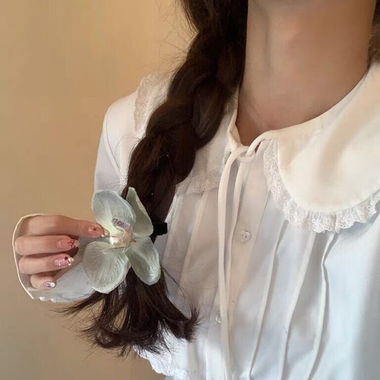 今世戴花蝴蝶结兰花朵边夹女氛围感拍照出片刘海夹海边度假头饰