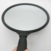 Look at the rear brain spoons mirror hairdresser stylist with a mirror after a round mirror with shank and mirror behind the back of the mirror