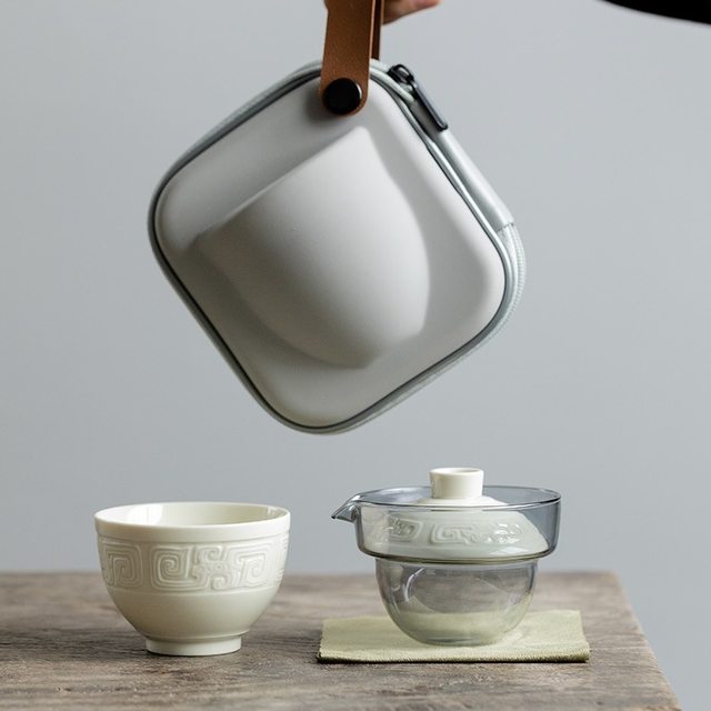 Imitation Song Dynasty Ding kiln white Taotie pattern quick cup hand-held pot tea cup set outdoor portable travel tea set for one person to drink