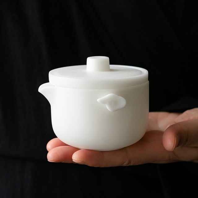 Suet-fat jade hand-grabbed pot for household high-end tea making special ceramic Kung Fu tea set tea water separation single pot 2025 new style