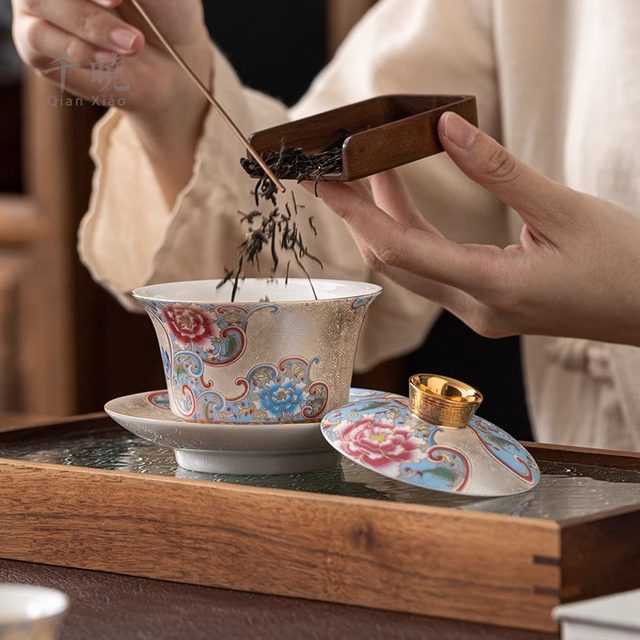 Handmade sterling silver filigree teapot and ceramic tureen