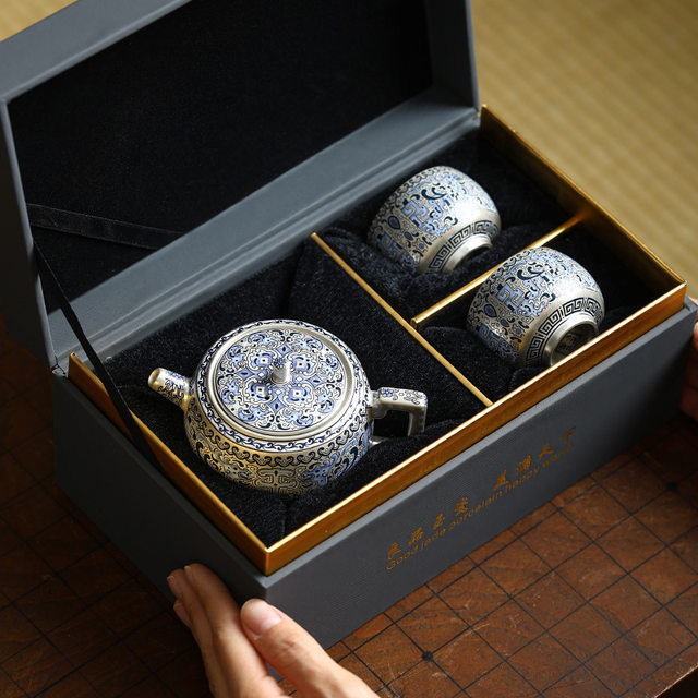 High-end handmade gilt silver teapot household tea and water separation single pot tea cup Kung Fu tea set one pot two cups