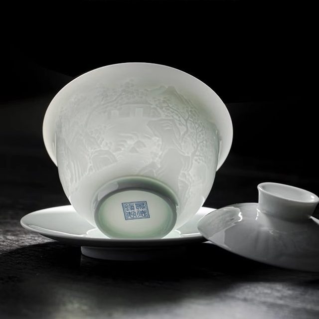 Jingdezhen Yingqing carved Sancai bowl single high-end tea bowl high-end Kung Fu tea set is not hot and has a thin tire
