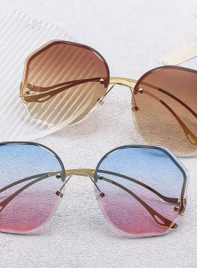 25新款街拍墨镜防紫外线透明海洋片女士金属无框多边形渐变太阳镜