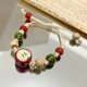 Who can resist such a healing ceramic apple bracelet?