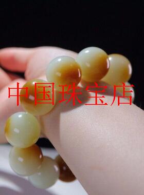 且末糖白和田玉俏色金皮玉手链籽