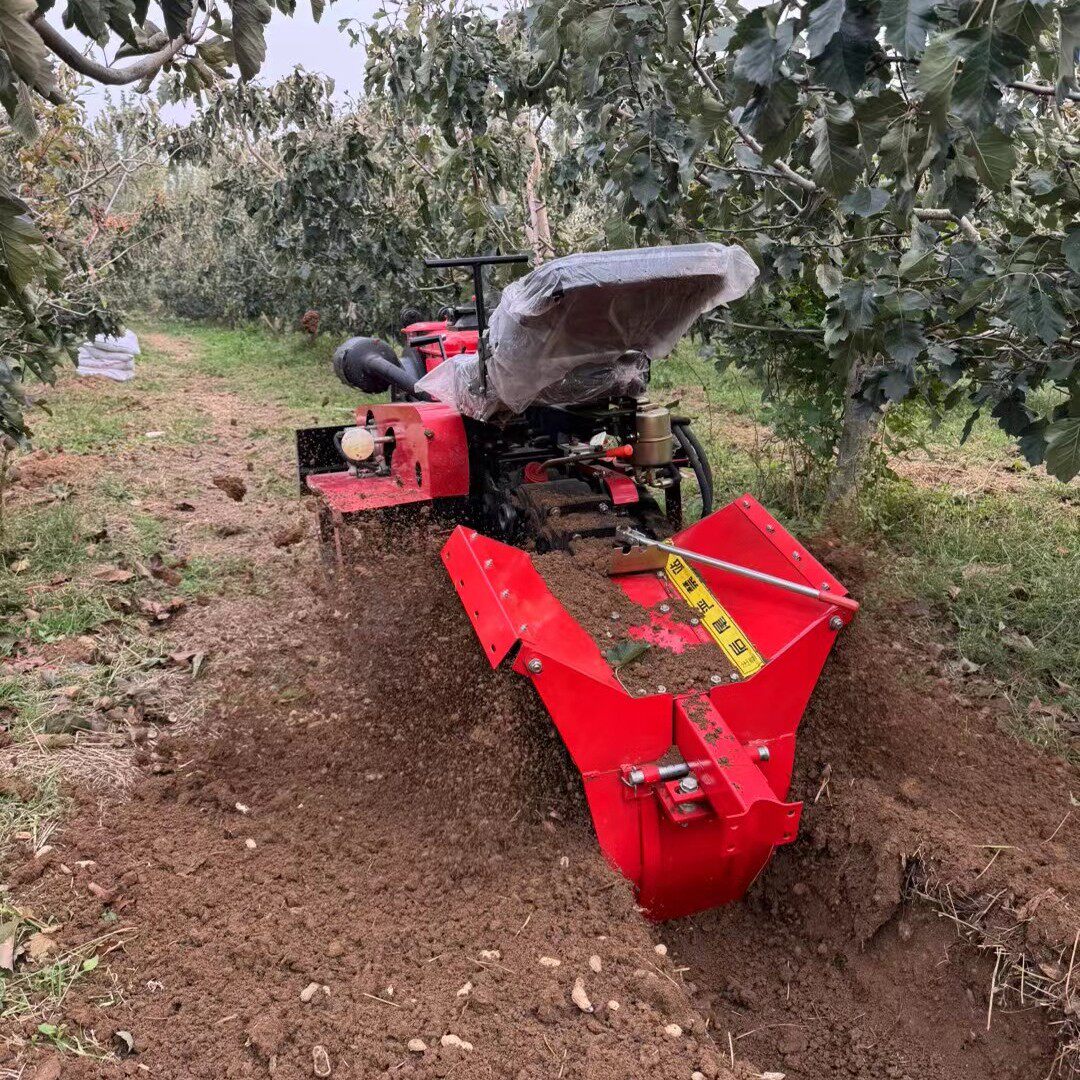 Multifunctional orchard soil loosening rotary tiller, ride-on fruit tree fertilization trenching machine, flood and drought dual-purpose crawler micro-tiller