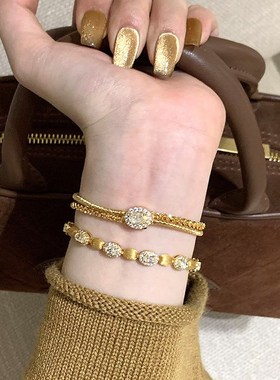 v金材质不掉色绕丝金丝镯手链女设计金弦线软镯工艺叠戴软手镯