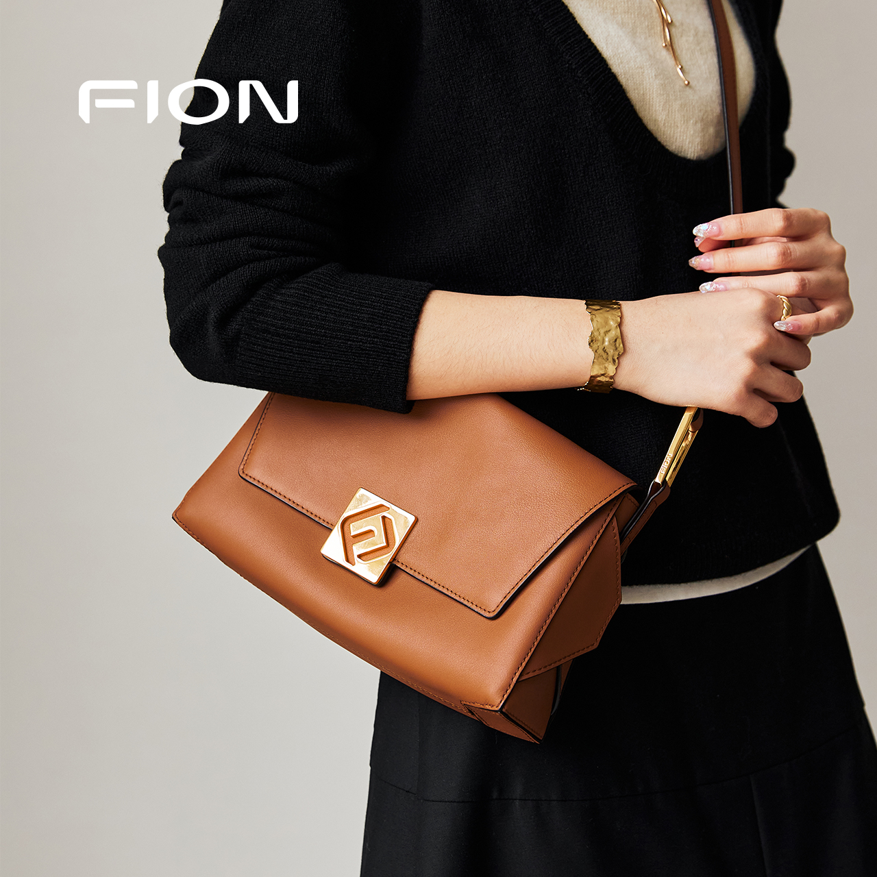 Fion/菲安妮真皮腋下包2025新款斜挎女包包高级感单肩叠叠法棍包
