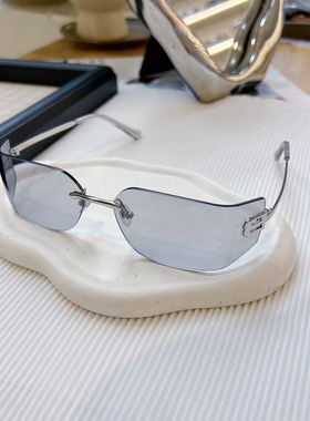 欧洲站时尚个性无框曲面太阳镜女防紫外线大框墨镜街头凹造型潮品