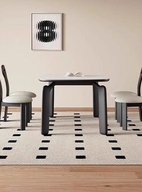 意式纯黑实木岩板长方形餐桌极简大象腿餐桌家用小户型设计师饭桌