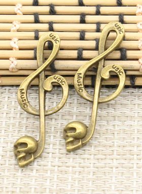 古青铜DIY吊坠 饰品配件 音符骷髅 39x15mm 20个 T10909