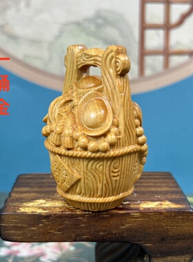 崖柏木雕刻一桶金文玩手把件