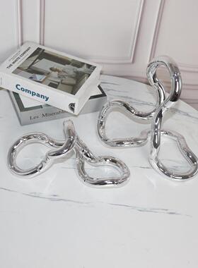 现代轻奢电视柜摆件家居客厅创意银色缠绕环形摆设样板间软装饰品