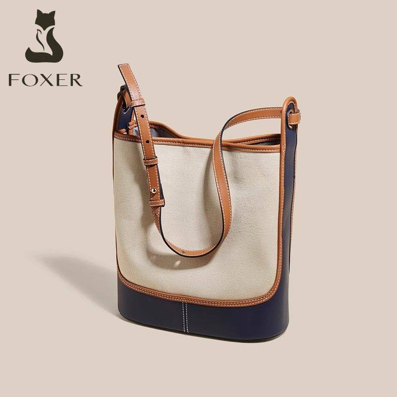 金狐狸包包女包2025新款帆布水桶包大容量小众时尚撞色单肩斜挎包,淘宝优惠券,粉丝福利购,淘宝优惠卷