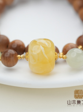 18K印度老山檀黑肉0.8蜜蜡和田玉