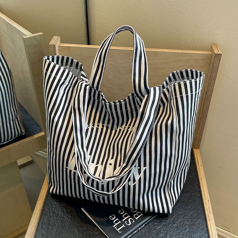 休闲大容量条纹托特包女2025新款时尚字母手提袋大学生单肩通勤包 - 图1