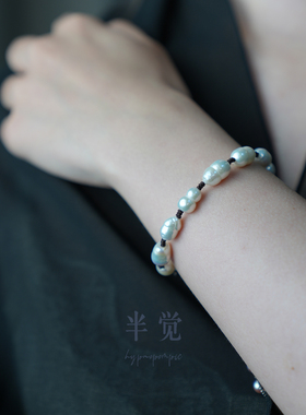 半觉白贝缠影绳扣手链