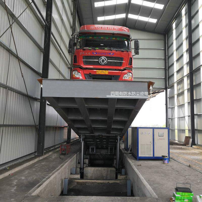 自动卸货平台60吨80吨100吨位后液压翻板卸车机货物倒运卸车机 - 图2