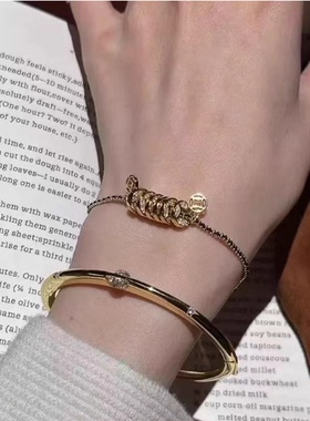 小钱贯黑金编绳小钱币手链