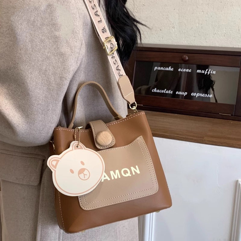 手提包小众撞色百搭通勤宽肩带斜挎包女2025春夏新款高级感水桶包,淘宝优惠券,粉丝福利购,淘宝优惠卷