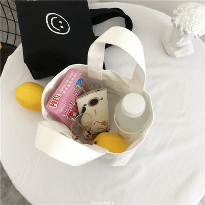 韩版ins超火可爱小包笑脸帆布袋敞口印花便当包手提袋迷你小包 女,淘宝优惠券,粉丝福利购,淘宝优惠卷