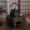 Ancient style tea ceremony cast iron charcoal stove four sacred beasts around the stove tea stove wood charcoal stove O Kung Fu tea set wind stove fire bowl cool