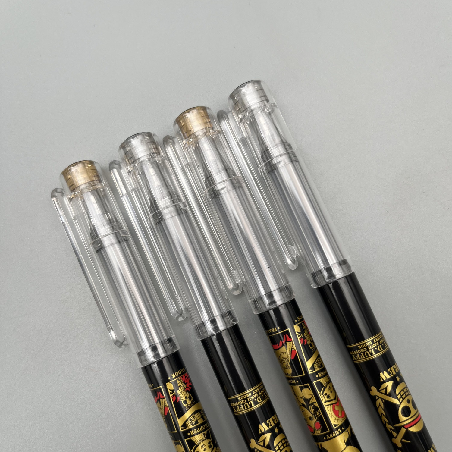 晨光航海王拔盖中性笔0.5mm黑色子弹头速干中空护套学生用笔记刷题作业考试办公高颜值动漫签字笔水笔B6702,淘宝优惠券,粉丝福利购,淘宝优惠卷