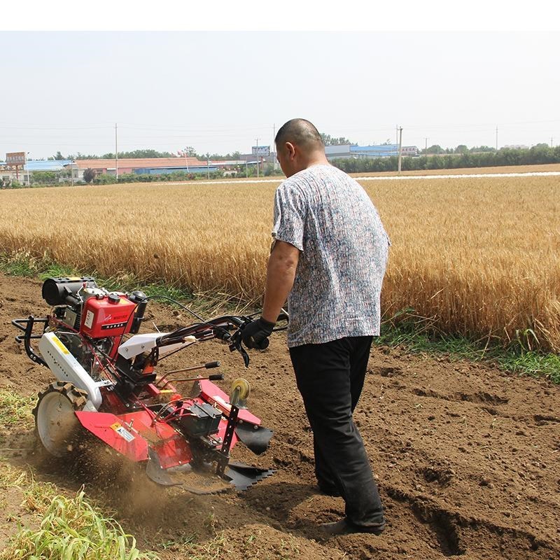 Diesel gasoline four-wheel drive small micro-tiller orchard field head rotary tiller self-propelled small four-wheel drive micro-tiller
