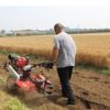 Diesel gasoline four-wheel drive small micro-tiller orchard field head rotary tiller self-propelled small four-wheel drive micro-tiller