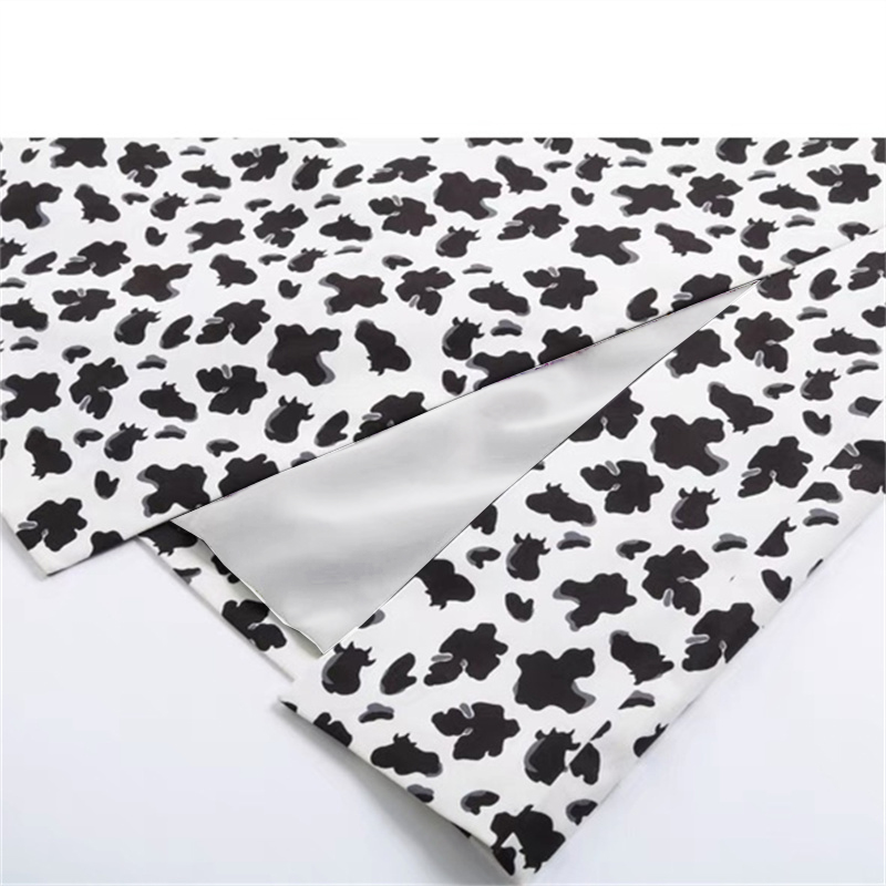 L417设计感小众奶牛纹印花开叉半裙2025秋冬中裙  鸟撤柜剪牌女装 - 图3