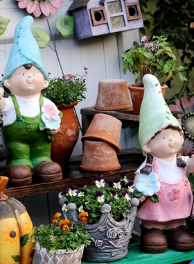 拿蚊拿的小孩花园摆件幼儿园户外C园林庭院太阳能灯路引小夜灯装