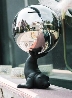 厂家直供创意海狮顶不锈钢球储蓄罐树脂摆件钱罐成人儿童只进不出