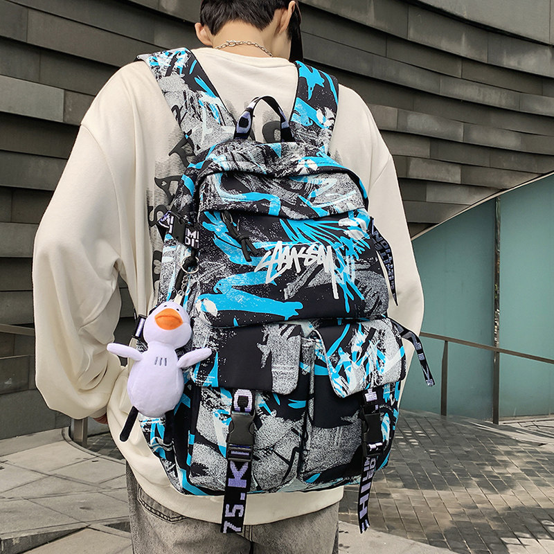 Backpack men's new large-capacity graffiti trendy sports and leisure travel computer backpack female junior high school school bag