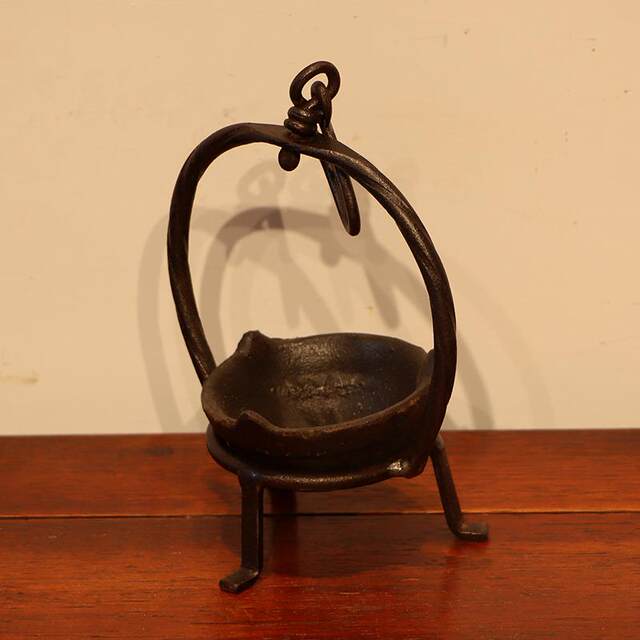 Folk old objects, cast iron small hanging lamps, nostalgic collection of retro film and television props, farmhouse ornaments, antiques and miscellaneous items