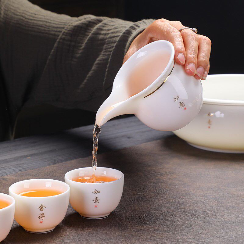 A complete set of mutton-fat jade white porcelain tea sets for home simple Chinese Kung Fu bubble H teapot cover bowl ceramic small teacup with cup